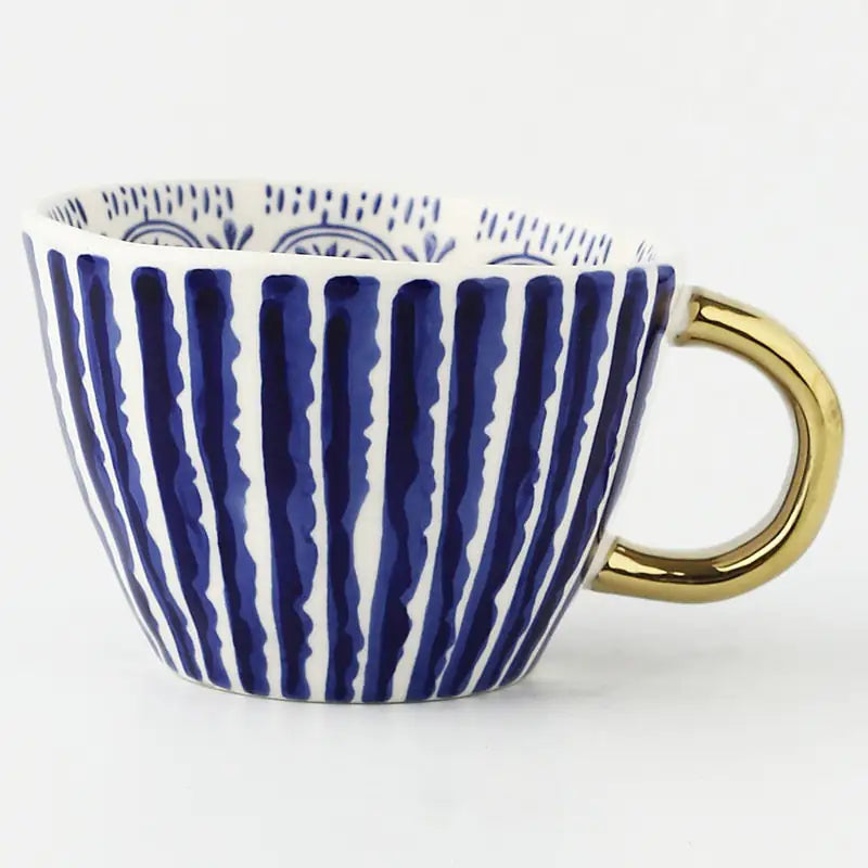 Taza de ceramica pintada a mano