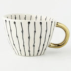 Taza de ceramica pintada a mano