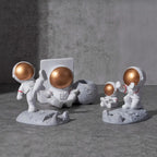 Soporte para teléfono móvil con forma de astronauta